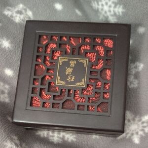 Vintage small wooden storage box with Bracelet, often used for jewelry